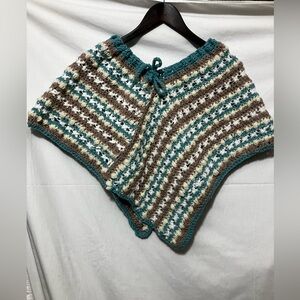 Handmade striped poncho for child